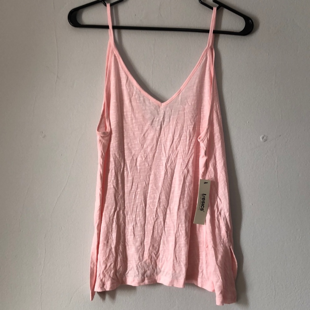 Pink tank top with deep cut back size small